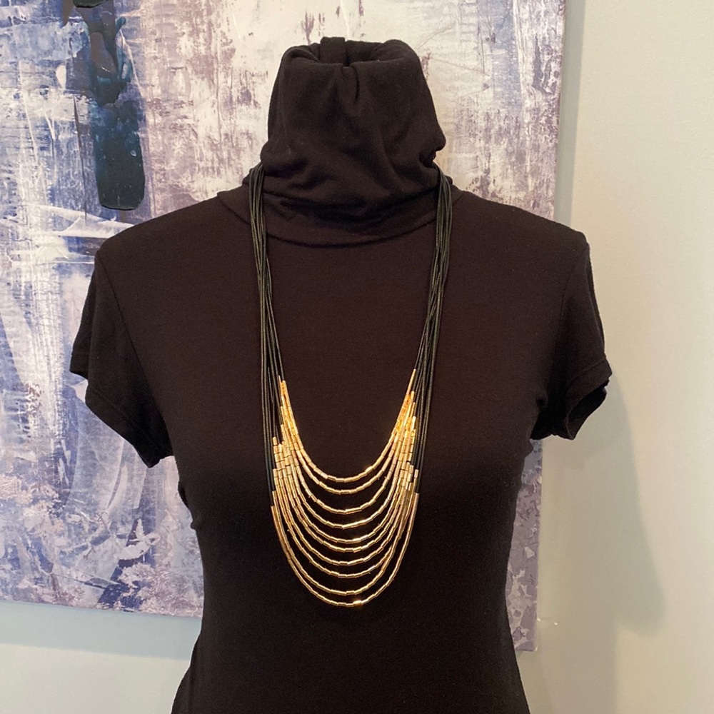 Black & gold long Guess necklace